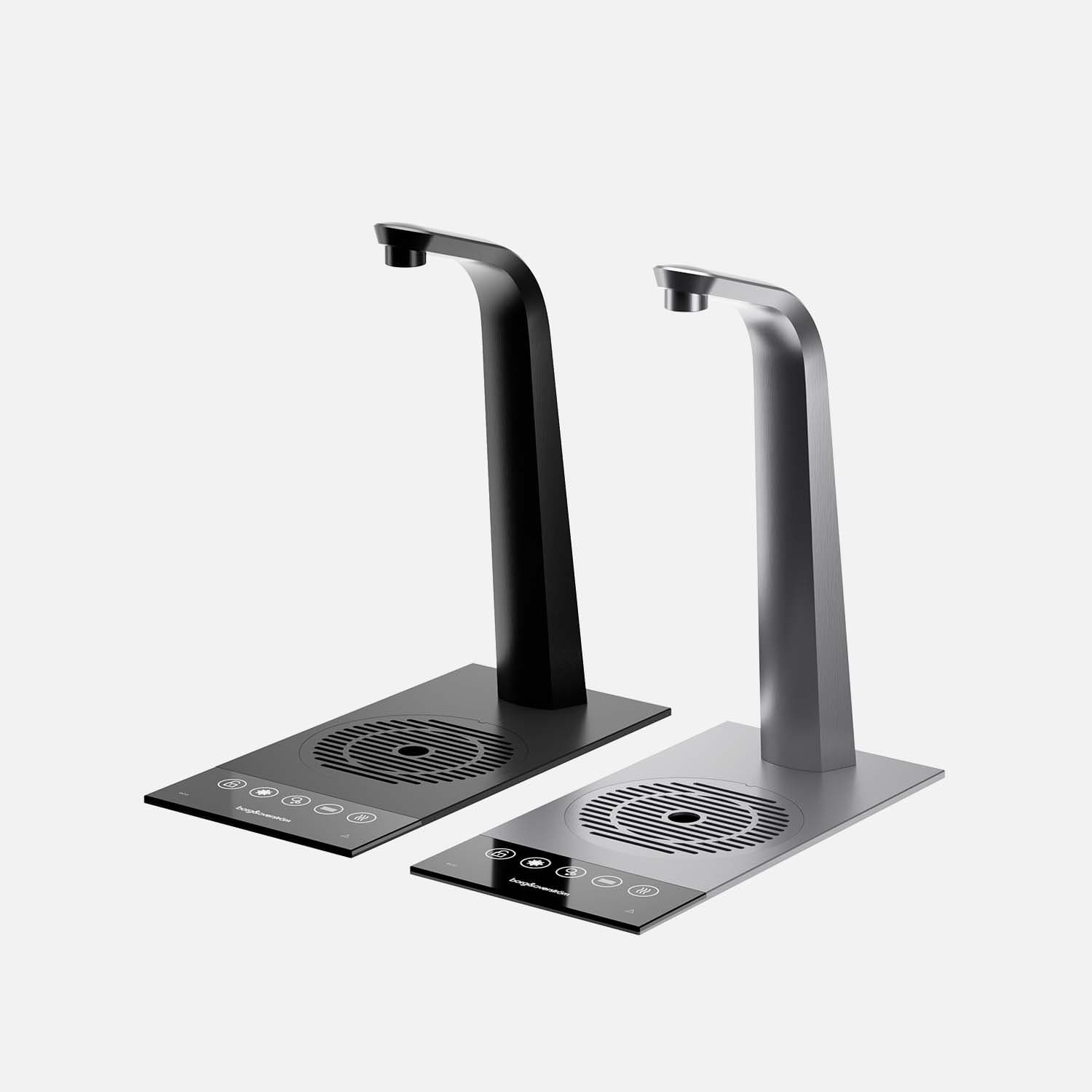 Black and silver drinking water tap towers with drip trays